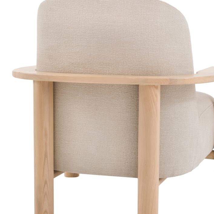 Gallery Direct Husby Armchair features a light wooden frame and a generously padded seat cushion in Willow Dusty natural coloured fabric