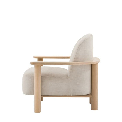 Gallery Direct Husby Armchair in Willow Dusty natural upholstery that is anchored by a minimalist light wooden frame