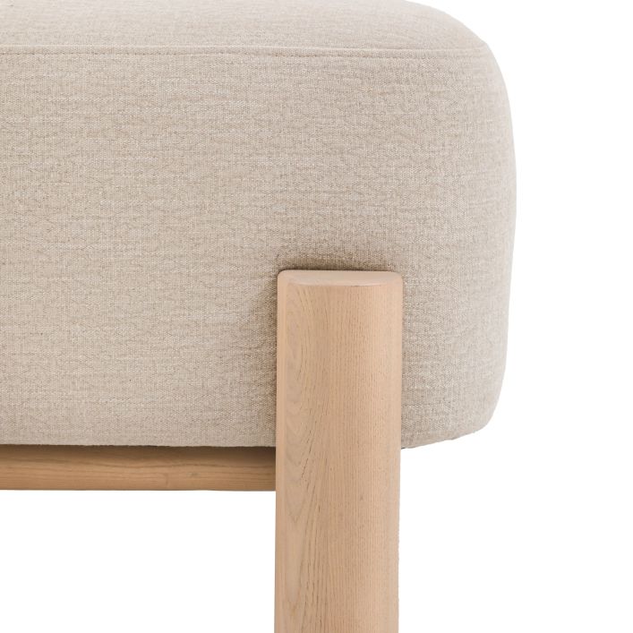 Gallery Direct Husby Footstool upholstered in Willow Dusty natural colour fabric, with a light wood base