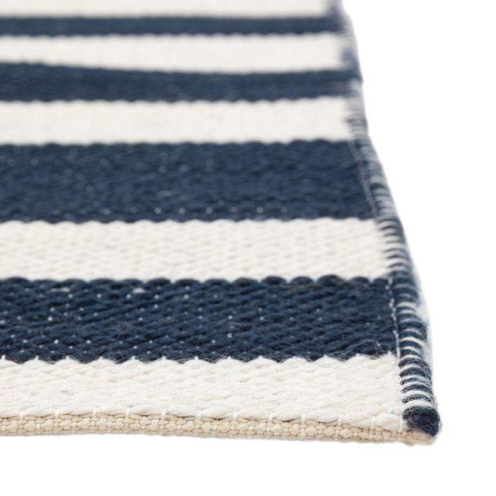 Gallery Direct Kingston Jacquard Rug measures 1200x1800mm and features a blue and white check pattern