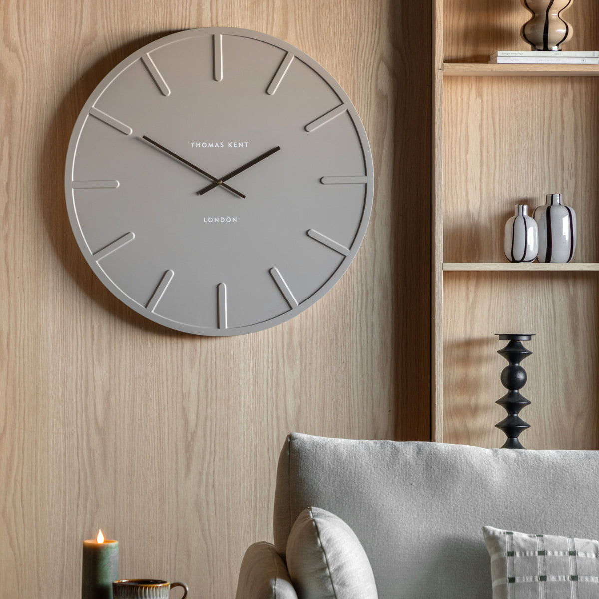 Gallery Direct Larson Wall Clock Grey displayed in a styled interior
