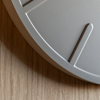 Gallery Direct Larson Wall Clock Grey, close-up of the clock face and finish
