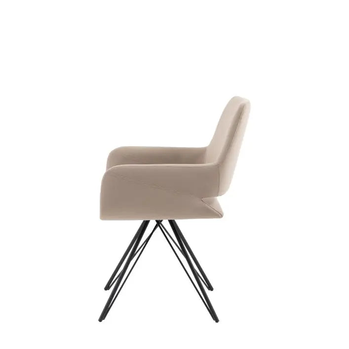 Gallery Direct Livorno Dining Chair is fully upholstery in a neutral Sand colour, with contrasting black metal legs