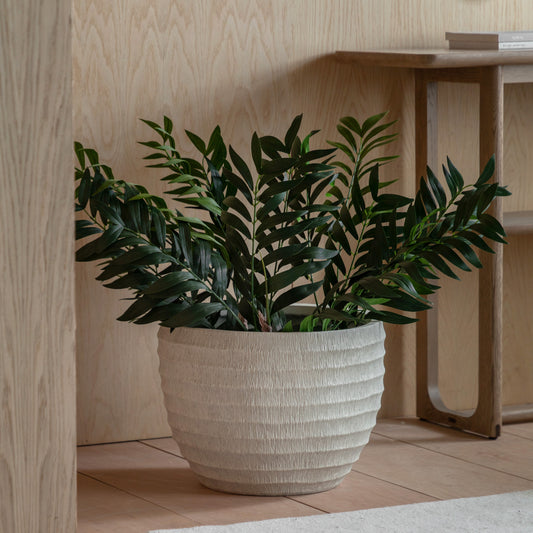 Gallery Direct Lorca Ridged Outdoor Planter White, styled in a supplier lifestyle setting