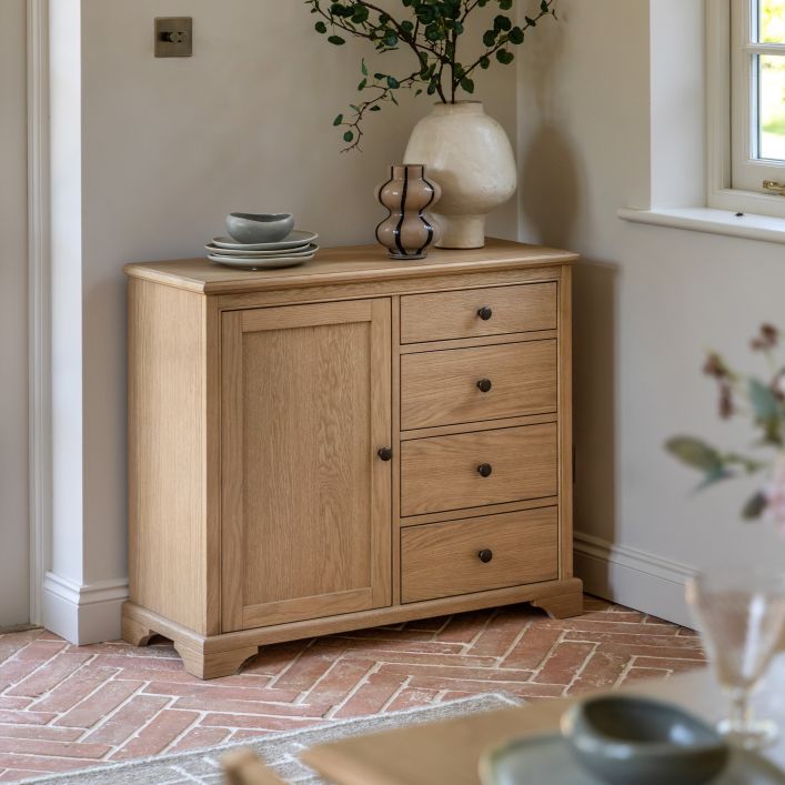 Gallery Direct Malvern Small Sideboard features 1 Cupboard Door and 4 Drawers with metal handles and a warm oak effect finish