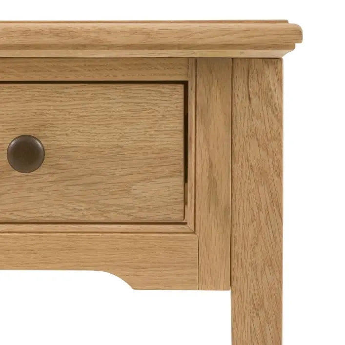 Gallery Direct Malvern Console Table features 1 drawer with metal handles, in a warm oak wood-grain finish