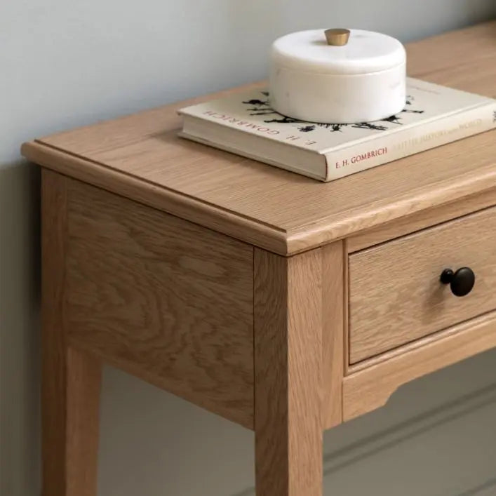 Gallery Direct Malvern 1 Drawer Console Table crafted from oak solids and veneers with a wood grain effect finish and round metal handles