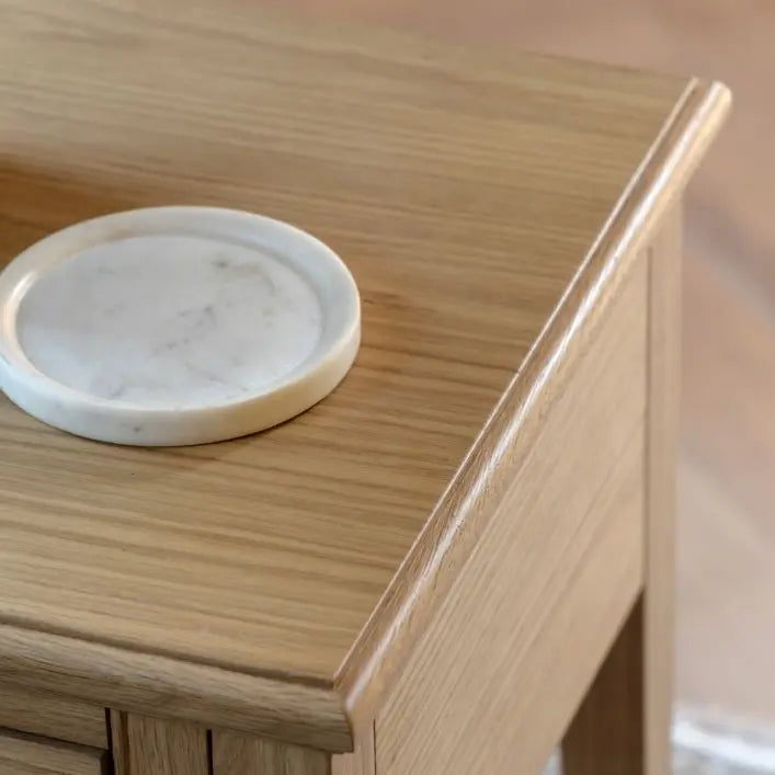 Gallery Direct Malvern 1 Drawer Side Table is made using premium oak solids and veneers with wood-grain patterns 