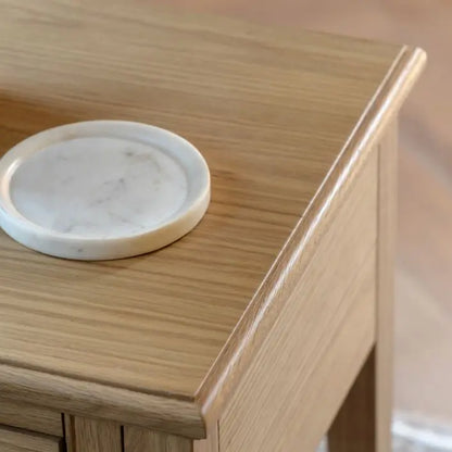 Gallery Direct Malvern 1 Drawer Side Table is made using premium oak solids and veneers with wood-grain patterns 