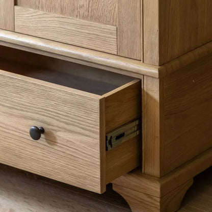 Gallery Direct Malvern 2 Door 1 Drawer Wardrobe is constructed from solid oak wood and premium veneers, showcasing the natural wood-grain patterns