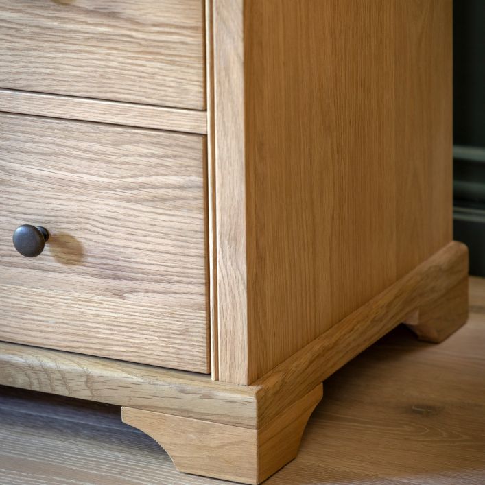 Gallery Direct Malvern 3 Drawer Chest crafted from premium solid oak and veneers with warm natural wood-grain throughout and complemented by dark metal handles