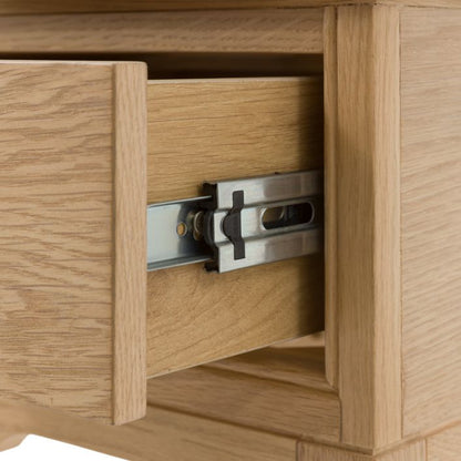Gallery Direct Malvern Small Bedside cabinet features 1 drawer and is crafted from oak solids and veneers with a warm wood-grain effect