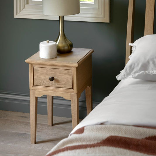 Gallery Direct Malvern Small Bedside Cabinet with 1 drawer and slim tapered legs, crafted from Oak solids and veneers with a warm wood-grain effect