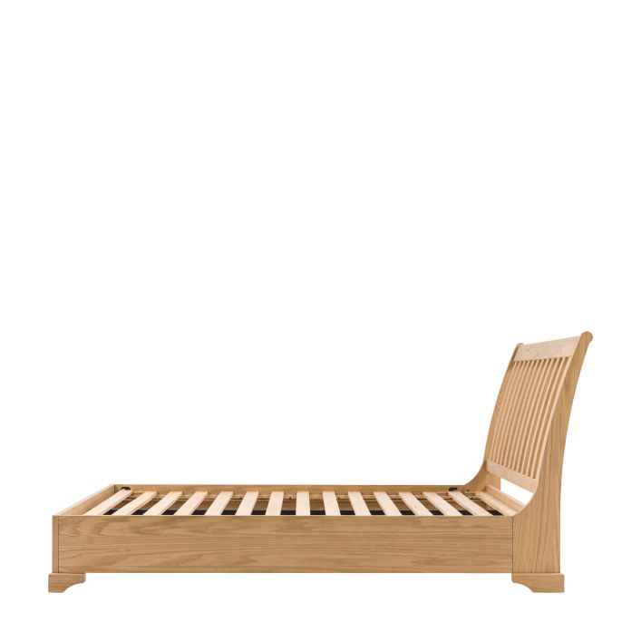 Gallery Direct Malvern Double Bed features a platform style frame with slatted headboard, in a solid oak and veneer construction 