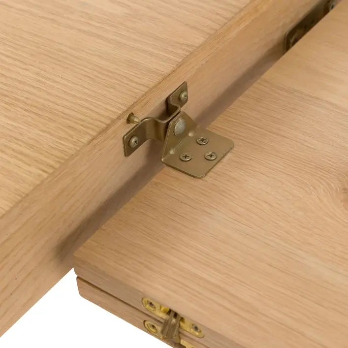 Gallery Direct Malvern Extending Dining Table crafted from solid oak woods and veneers, with a hidden extension mechanism