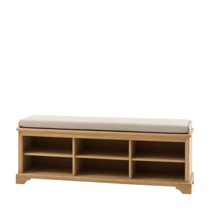 Gallery Direct Malvern Hall Bench is constructed from premium oak solids and veneers with six storage cubbies, and features a natural toned upholstered cushion on top