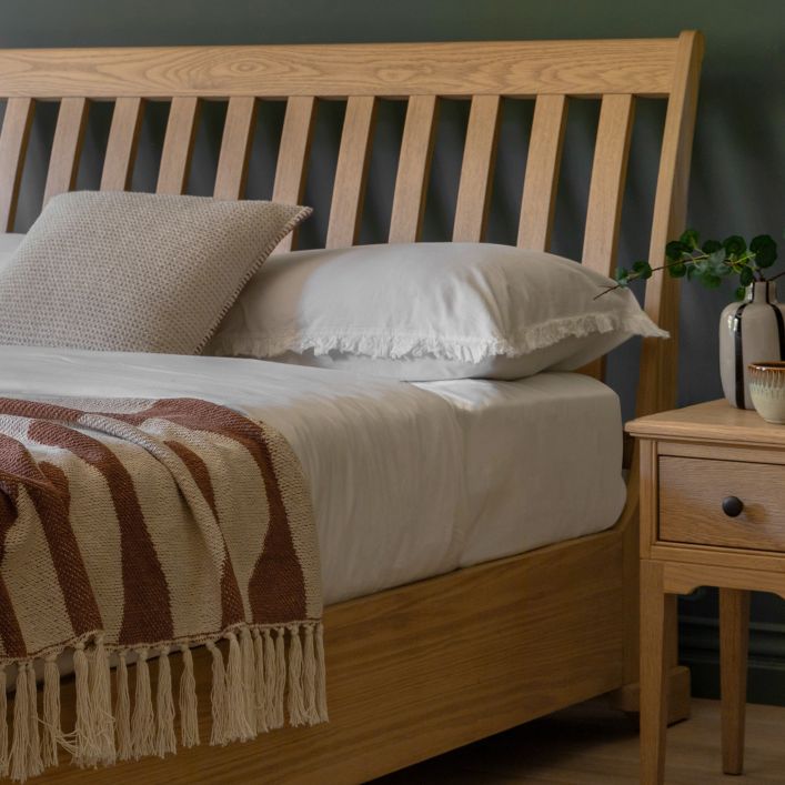 Gallery Direct Malvern King Size Bed features an ergonomically supportive headboard and a platform style frame in solid oak wood and veneers with wood-grain patterned finish