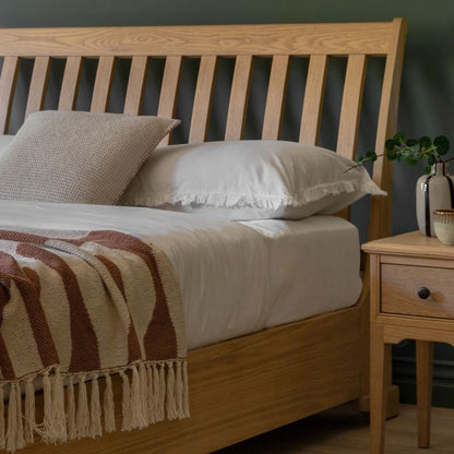 Gallery Direct Malvern King Size Bed features an ergonomically supportive headboard and a platform style frame in solid oak wood and veneers with wood-grain patterned finish