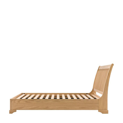 Gallery Direct Malvern King Size Bed with a platform style frame and a slatted headboard, constructed from solid oak woods and veneers