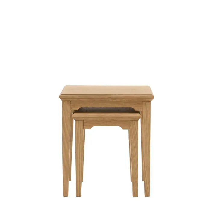 Gallery Direct Malvern Nest of 2 Side Tables that can be stacked or used separately, both feature slim tapered legs and have a wood grain natural finish