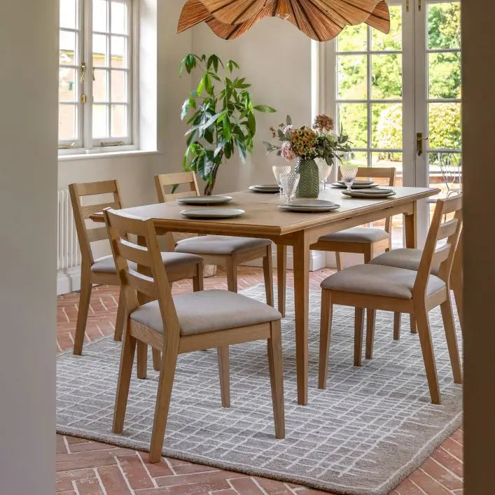 Gallery Direct Malvern Pair of Dining Chairs with slatted back design and generously padded seat in a neutral upholstery, crafted from quality wood and oak veneers with a natural finish