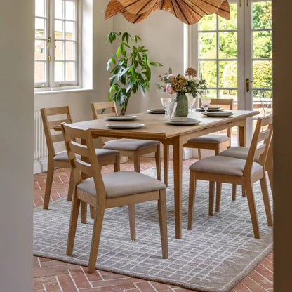 Gallery Direct Malvern Pair of Dining Chairs with slatted back design and generously padded seat in a neutral upholstery, crafted from quality wood and oak veneers with a natural finish