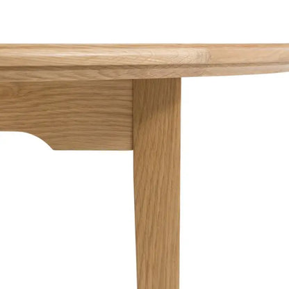 Gallery Direct Malvern Round Extending Dining Table constructed from solid oak woods and veneers with wood grain pattern finish