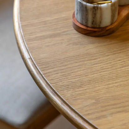 Gallery Direct Malvern Round Extending Dining Table constructed from warm oak solids and veneers with a natural wood grain finish
