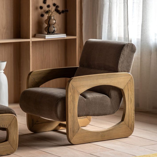 Gallery Direct Marco Armchair in Verona Sepia generously padded upholstery, with a bold wooden modern frame that provides a statement piece of furniture with architectural presence 