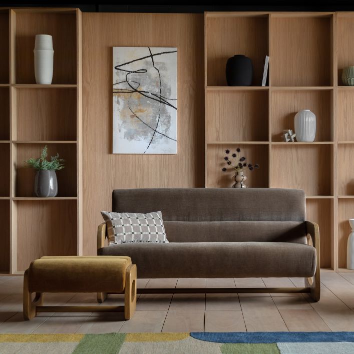 The Gallery Direct Marco Footstool is available in Verona Golden or Verona Sepia coloured upholstered, with a sculptural wooden frame