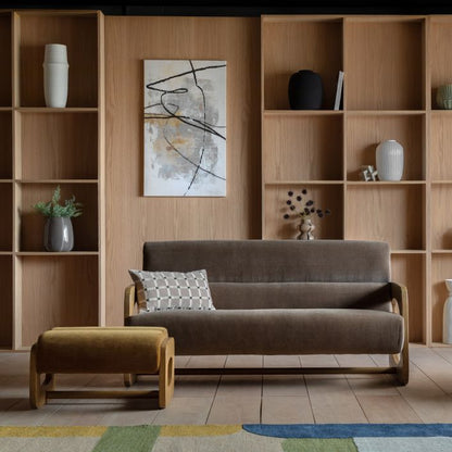 The Gallery Direct Marco Footstool is available in Verona Golden or Verona Sepia coloured upholstered, with a sculptural wooden frame