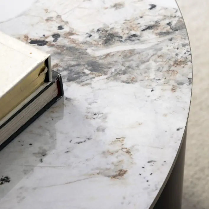 Gallery Direct Marzio Coffee Table features a marble-style stone table top with unique natural veining
