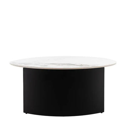 Gallery Direct Marzio Round Coffee Table with a Carrara marble style stone table top and curved black metal legs