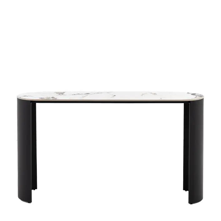 Gallery Direct Marzio Console Table features a gently curved silhouette, sleek black metal legs, and a stunning marble stone table top 
