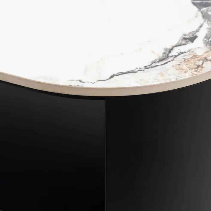 Gallery Direct Marzio Media Unit features a Carrara marble stone table top with natural veining, and a matt black metal frame with mid level open shelf