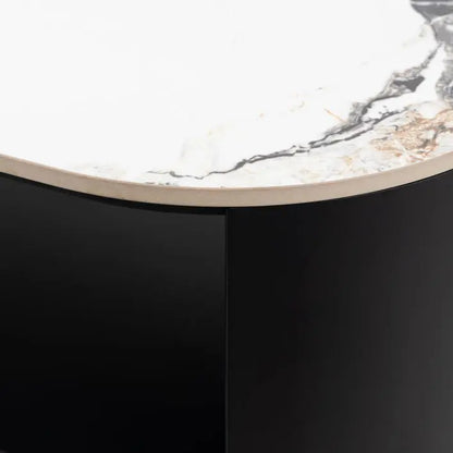 Gallery Direct Marzio Media Unit features a Carrara marble stone table top with natural veining, and a matt black metal frame with mid level open shelf
