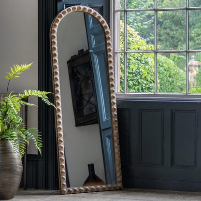 Gallery Direct Millbrook Arch Leaner Mirror displayed in a styled interior