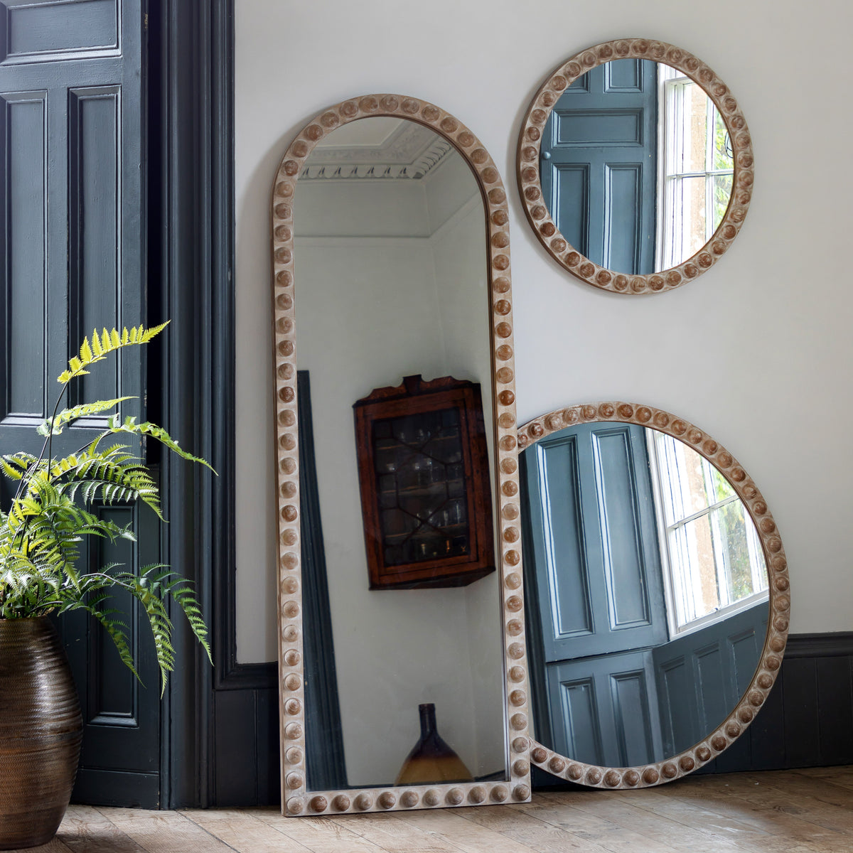 Gallery Direct Millbrook Arch Leaner Mirror displayed in a styled interior