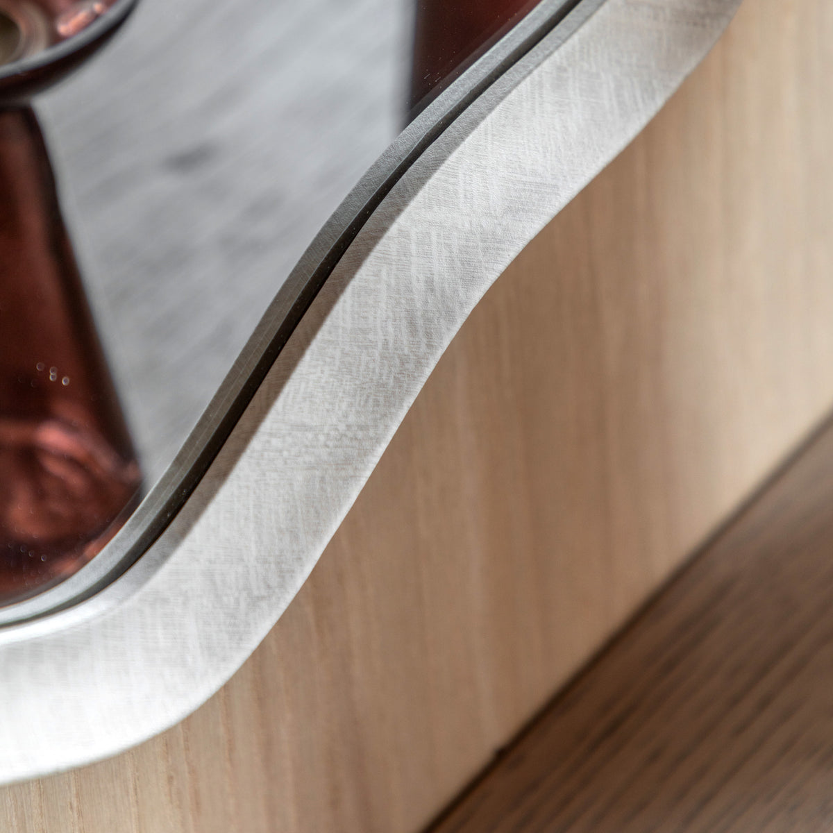 Gallery Direct Monterey Wave Round Mirror Smoke, close-up of the mirror and frame details