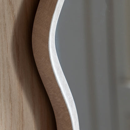 Gallery Direct Monterey Wave Round Mirror Smoke, close-up of the mirror and frame details