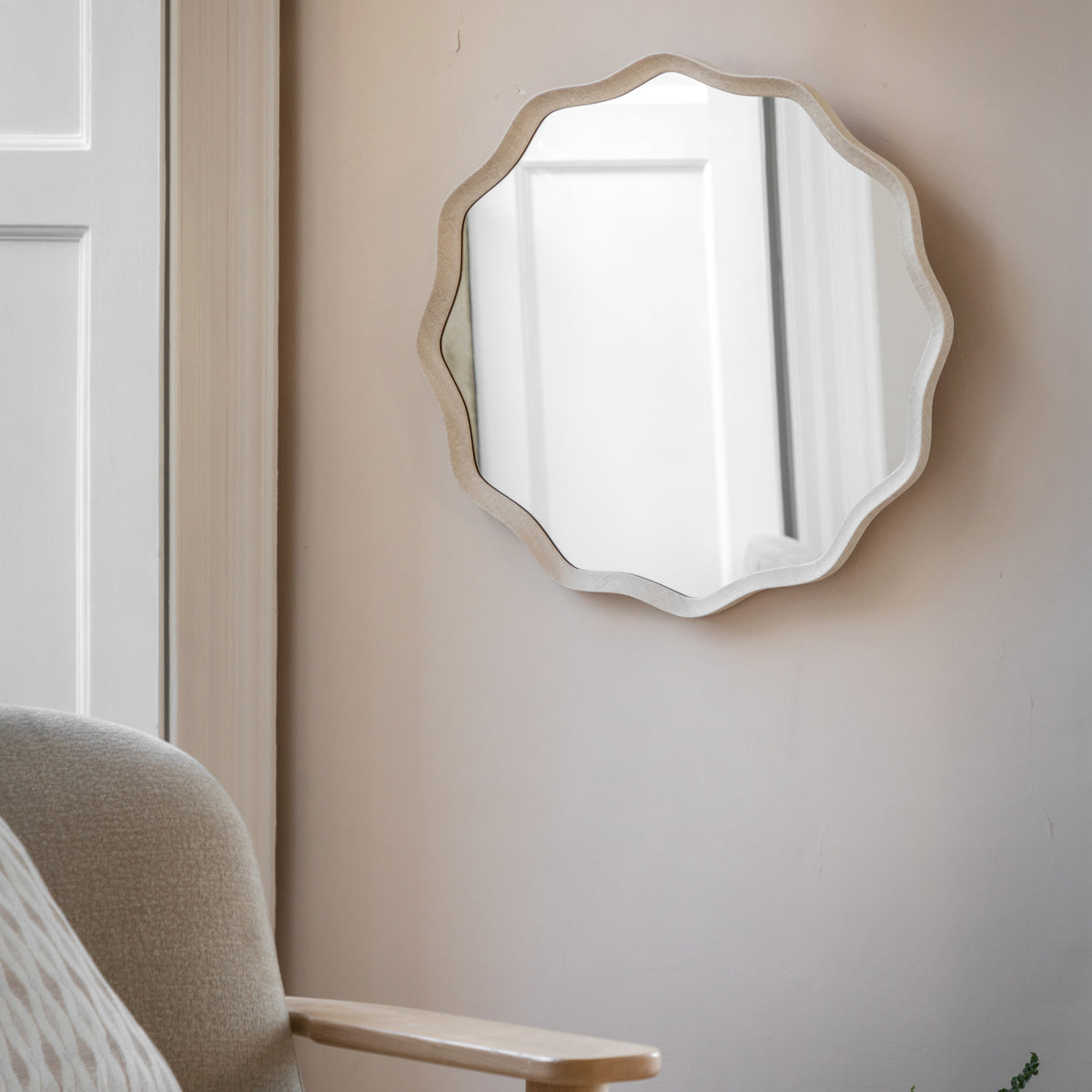Gallery Direct Monterey Wave Round Mirror Smoke displayed in a styled interior