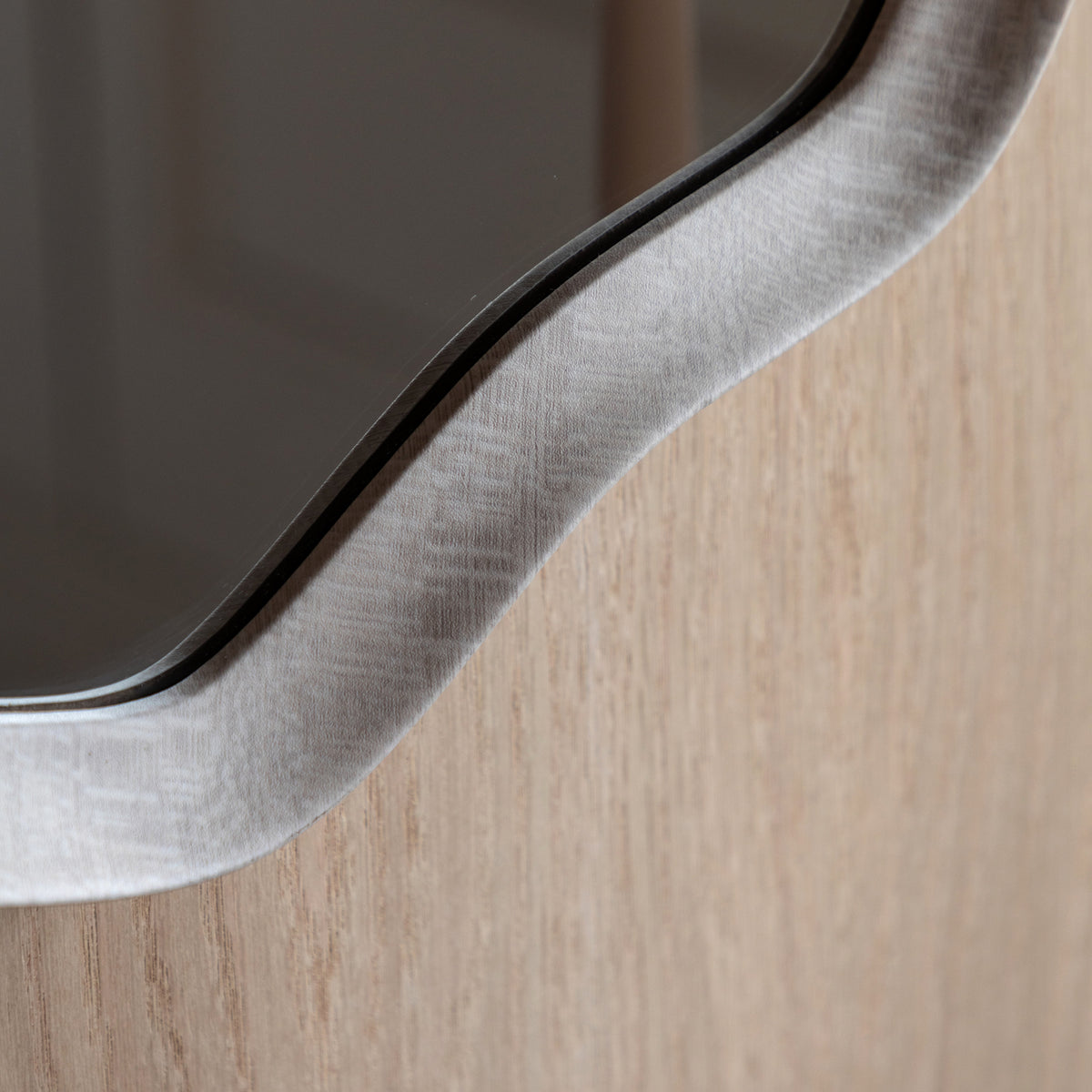 Gallery Direct Monterey Wave Round Mirror Smoke, close-up of the mirror and frame details