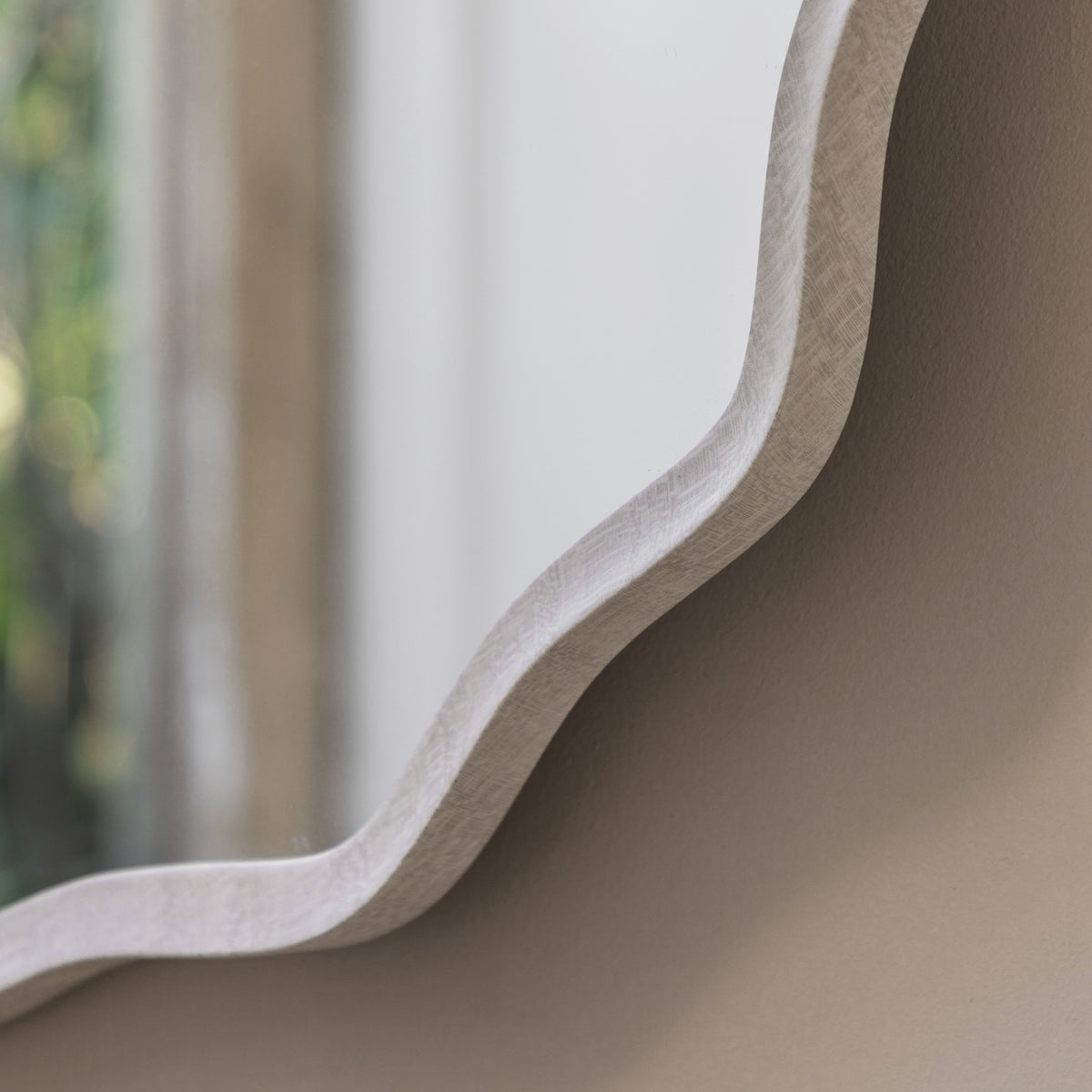 Gallery Direct Monterey Wave Round Mirror Smoke, close-up of the mirror and frame details