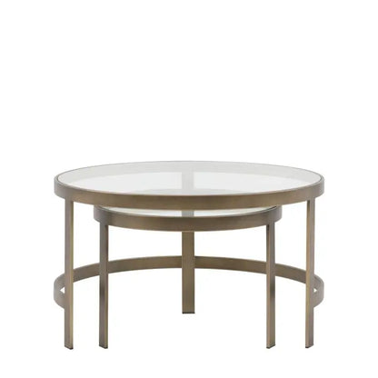 Gallery Direct Monti Nest of Tables features 2 round tables that tuck underneath each other, with glass table tops and metal legs