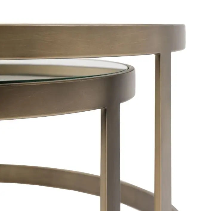 Gallery Direct Monti Nest of 2 Round Tables are made from bronze toned metal frames and toughened glass table tops