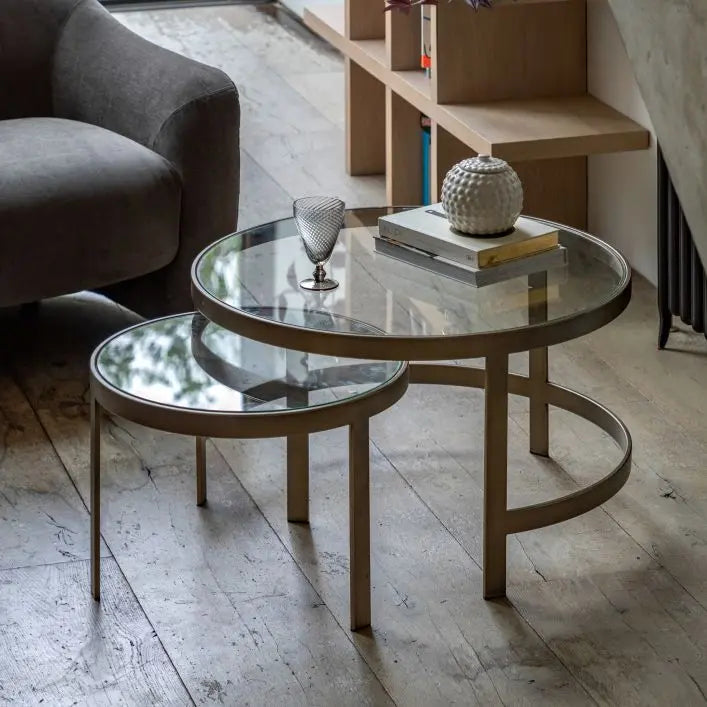 Gallery Direct Monti Nest of Tables with a modern curved design, feature 2 toughened glass topped tables and bronze toned frames