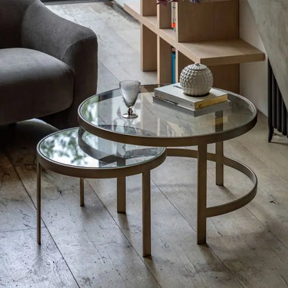 Gallery Direct Monti Nest of Tables with a modern curved design, feature 2 toughened glass topped tables and bronze toned frames