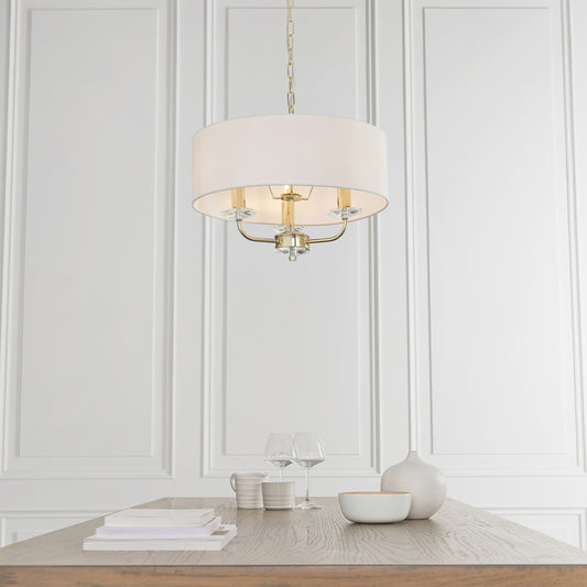 Gallery Direct Nixon 3 Pendant Light Brass, styled in a room setting