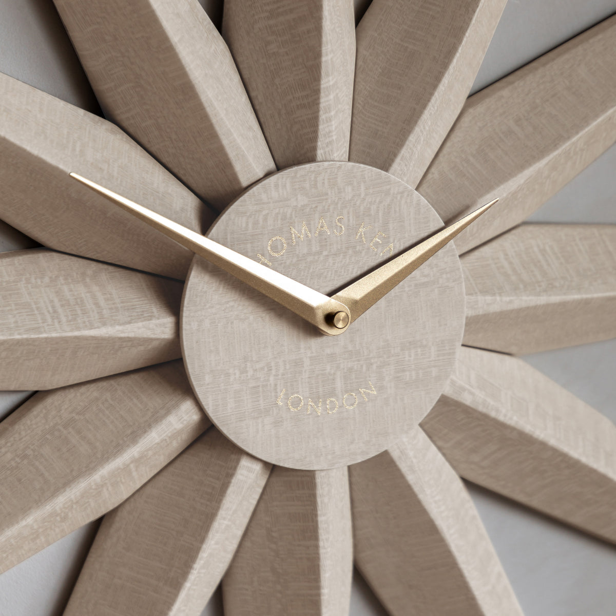 Gallery Direct North Star Wall Clock Light Grey, close-up of the clock face and finish