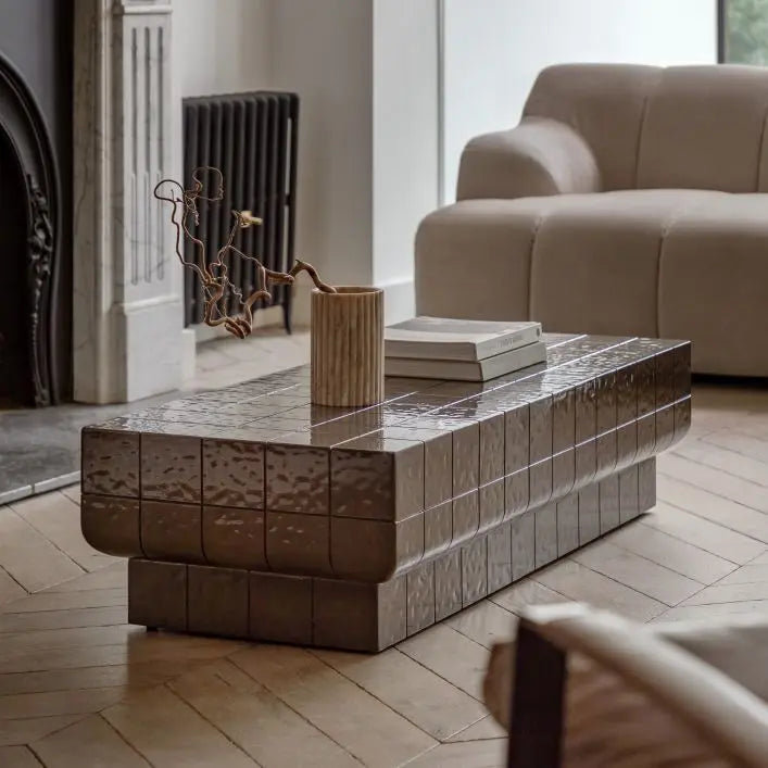 The Gallery Direct Novara Rectangular Coffee Table is an Italian Retro inspired piece of furniture, created from glass reinforced concrete with a charcoal brown colour glaze